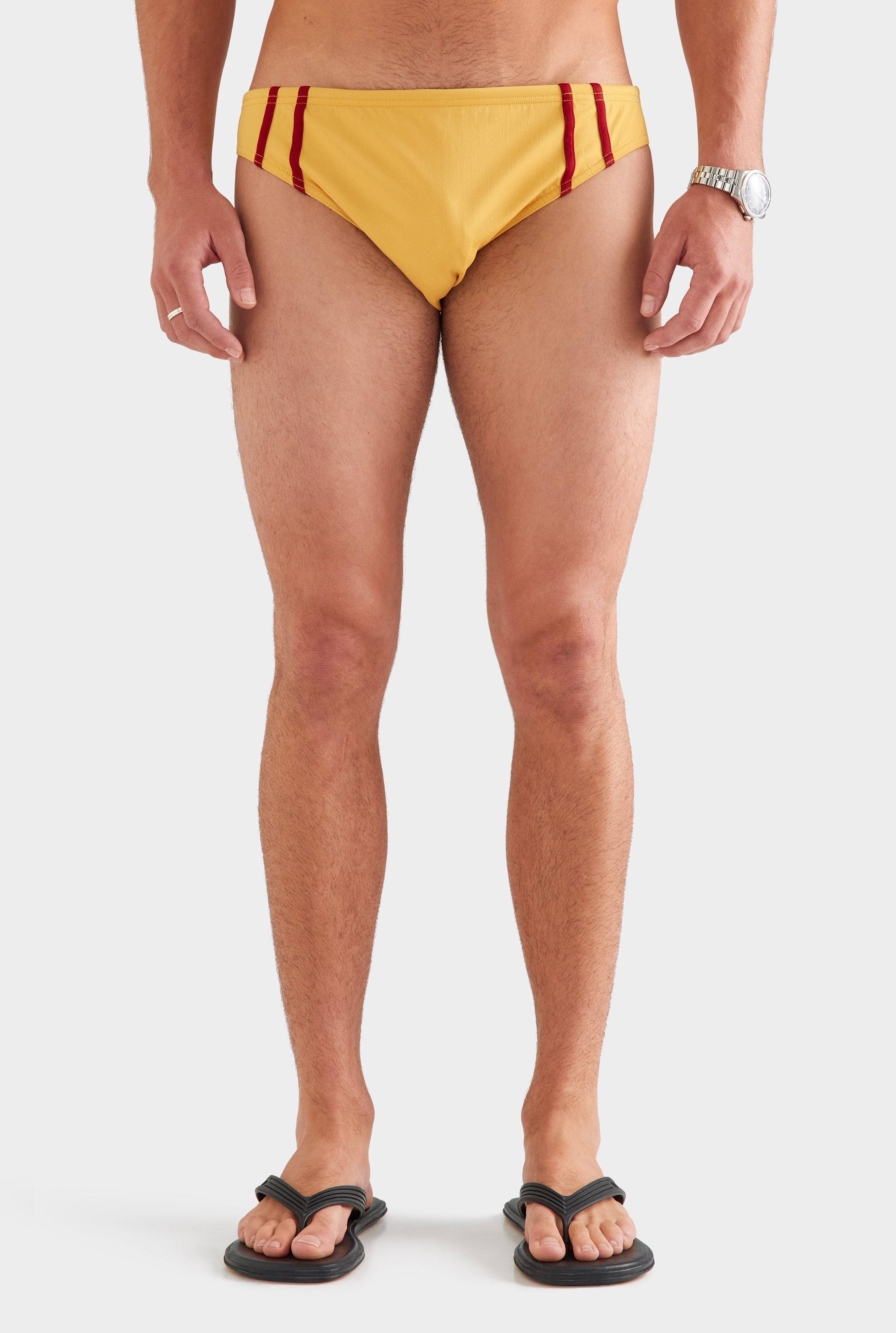 Tape Trim Swim Brief - Ochre/Red [[AU_MEDIA:gid://shopify/MediaImage/27759712108631]]