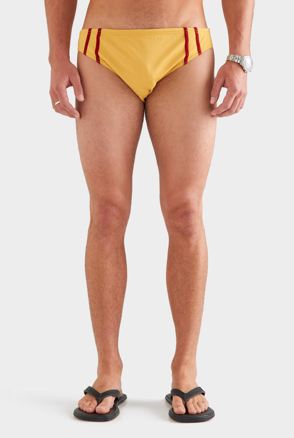 Tape Trim Swim Brief - Ochre/Red [[AU_MEDIA:gid://shopify/MediaImage/27759712108631]]